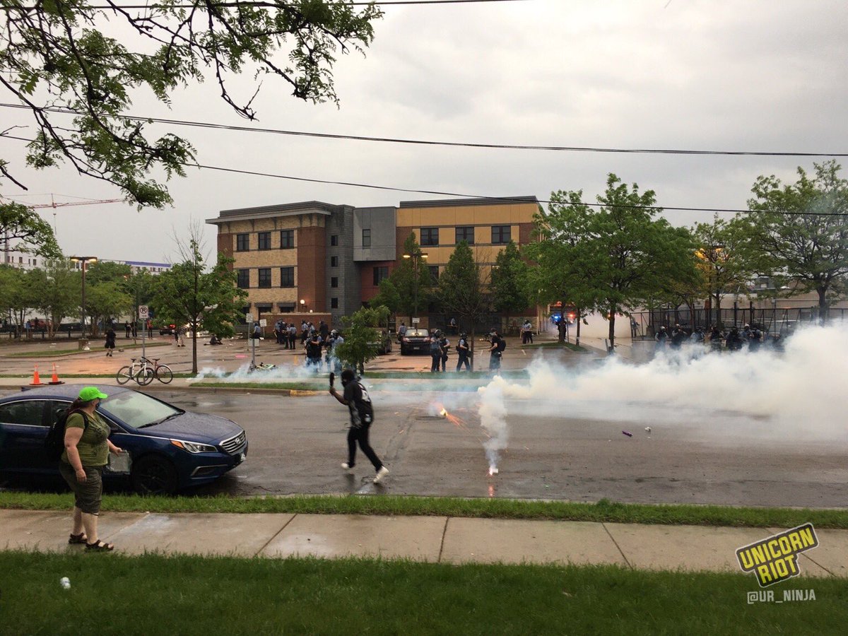 Minneapolis PD continuing to fire tear gas at protesters across the street from the 3rd Precinct