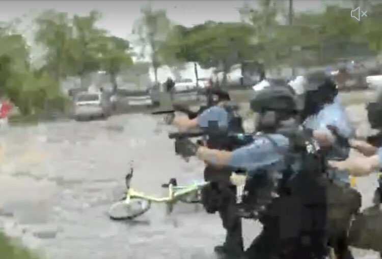 Battle scenes outside the third precinct in Minneapolis as crowds protesting the murder of  #GeorgeFloyd defend themselves against armed riot police firing tear gas canisters