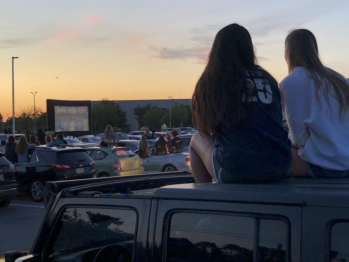 HillsboroughSch's tweet photo. Tonight was supposed to be graduation for Steinbrenner High. Instead, the senior class gathered as the sun set at 20:20 to watch their Senior Slideshow — drive-in style! Congratulations @gshswarriors Class of 2020!

@AddisonGDavis https://t.co/7z2cARpkxc