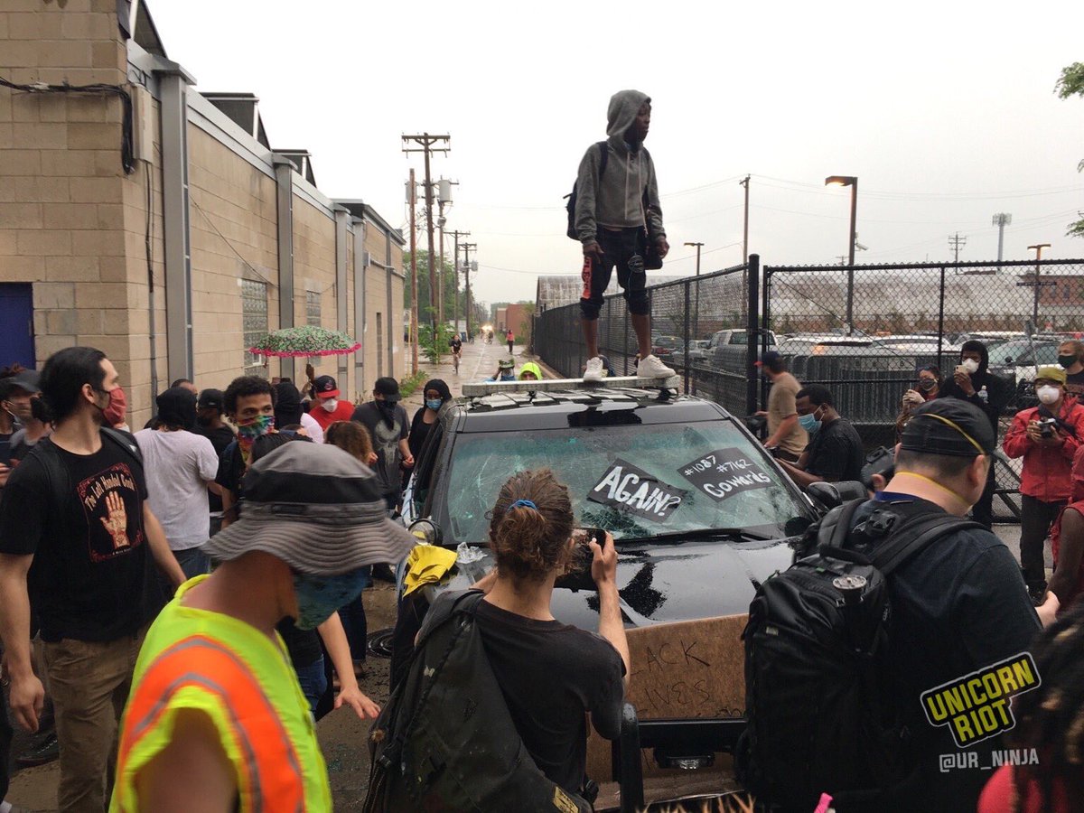 Antifa news site Unicorn Riot has posted photos of the riot outside a Minneapolis Police precinct tonight. An angry crowd gathered in response to the police-involved death of George Floyd. They destroyed a police car & hurled projectiles. Police used tear gas to disperse rioters.