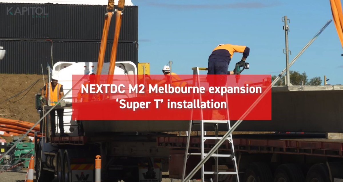 NEXTDC's tweet photo. We're on track with the expansion works at M2 #Melbourne which are rolling along at an extraordinary pace. Three new #datahalls in a matter of days, thanks to the ingenious addition of these giant “Super Ts”. WATCH HERE: https://t.co/sev4fMWlDj #wherethecloudlives #cloudcapacity https://t.co/WD16BkcMXR