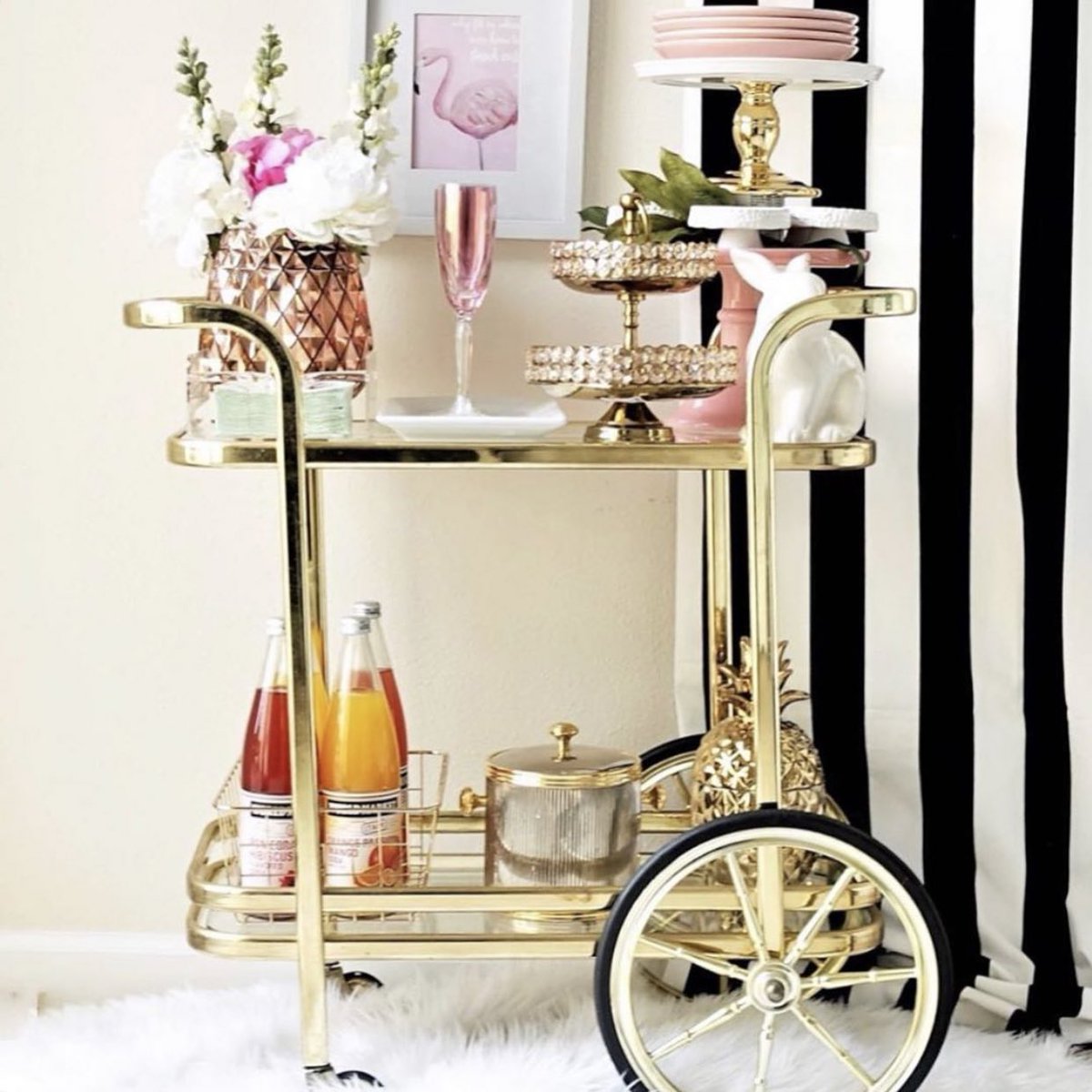 Drinks will be had. What bar cart is yours?1. Golden Bamboo2. Glam Glass3. Rolling Round3. Acrylic Corner