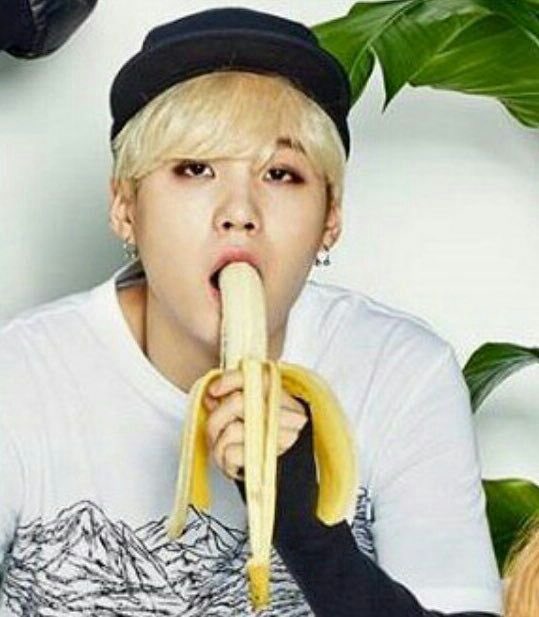 eating banana for a photoshoot