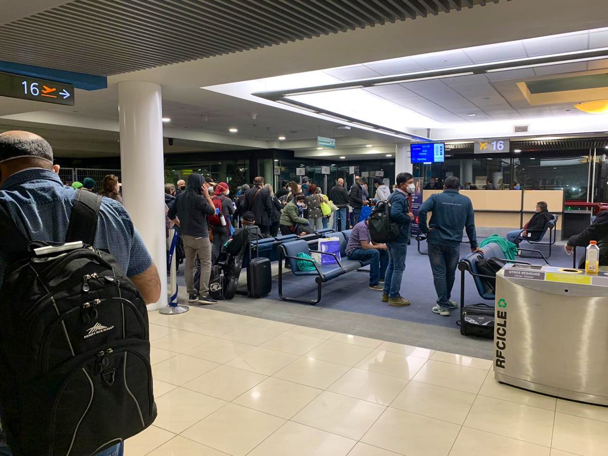 AusEmbCL's tweet photo. Early this morning we farewelled more than 70 Aussies and permanent residents on a @LATAM_CHI Argentinian 🇦🇷 repatriation flight back home to 🇦🇺 . I was glad to be able to offer some support along with other Embassy staff (see photos 👇). @EmbAustraliaBA https://t.co/v18oyr1li2