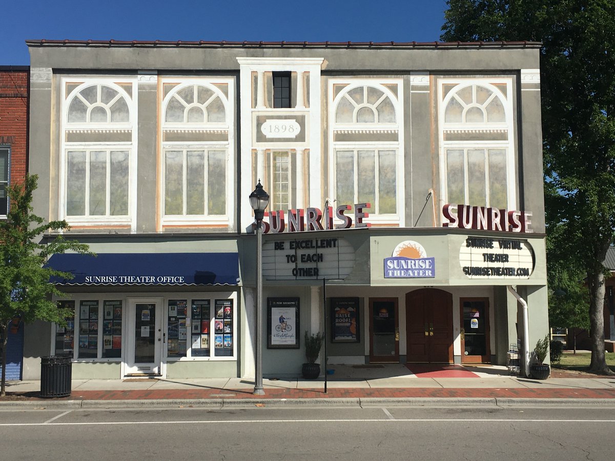 Sunrise Theater – Southern Pines, NCWhile their doors are closed, this renovated 1940s cinema is promoting their Sunrise Virtual Theater on one side of the marquee and using the other side for fun/inspirational movie quotes.Support:  http://www.sunrisetheater.com/donate-to-the-sunrise.html