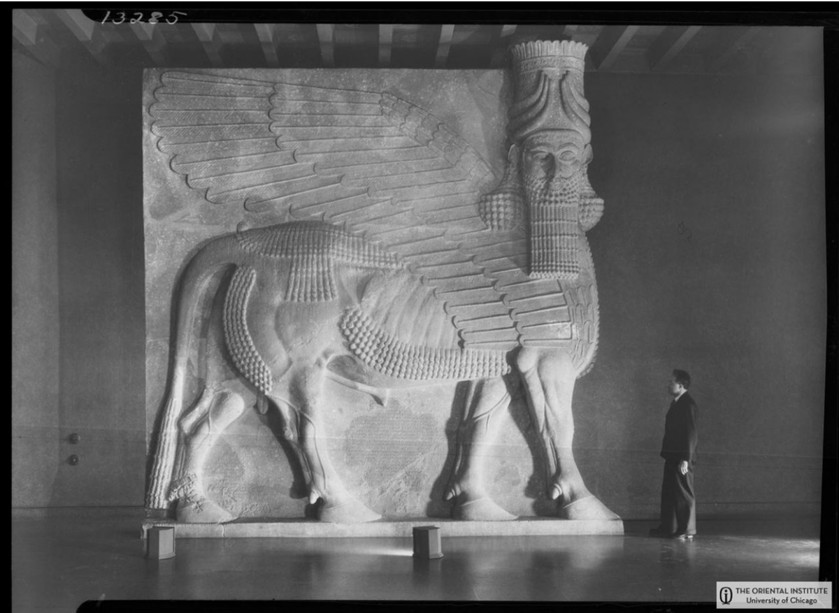 Upon arriving in Chicago, the Lamassu already being severed in pieces, the boxes are loaded into a museum, and the Lamassu is put back together, and cemented into the ground. Never to move again.