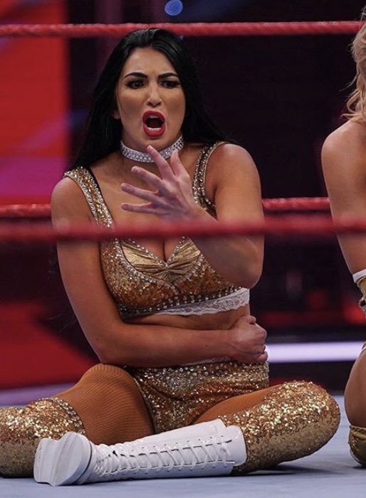 TheIIconicsWWE's tweet photo. When #TheIIconics win 4 more Tag Team Championships, @BillieKayWWE will go full on @BookerT5x https://t.co/q3etKQ1WxC