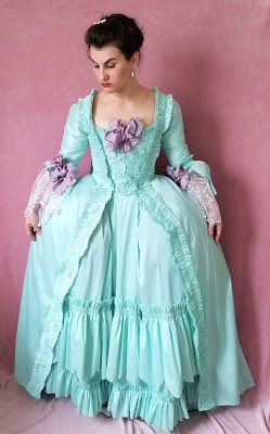 Hoops gave This Look, which is likeX THE silhouette you think of when you think 18th century. They also had slots in them usually and if they were closed on the bottom you could use them as pockets, or access your tied on pocket THROUGH them!!! ( http://ladauphinecostuming.blogspot.com/2018/03/?m=1 )