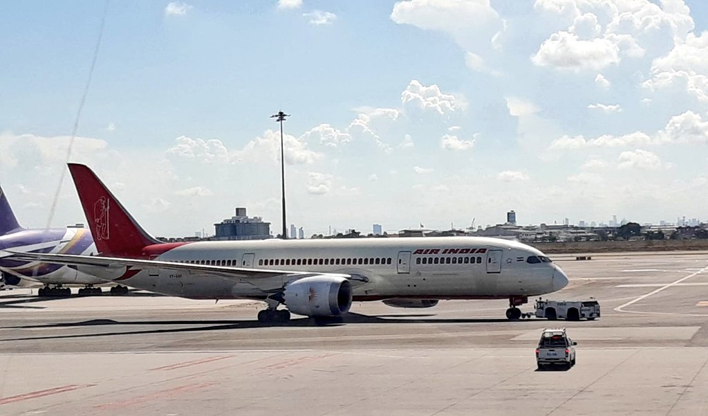 IndiainThailand's tweet photo. AI 335 to Delhi departs with 236 Indians. Amb Suchitra &amp; colleagues see them off. Grt job by consular team led by Counsellor Ashwin Kotnis &amp; support by DA Gp Capt Krishnan. Thankyou @airindiain. Thankyou @MFAThai 

@IndianDiplomacy 
@DrSJaishankar
#VandeBharatMission https://t.co/9nUxpVOZQp
