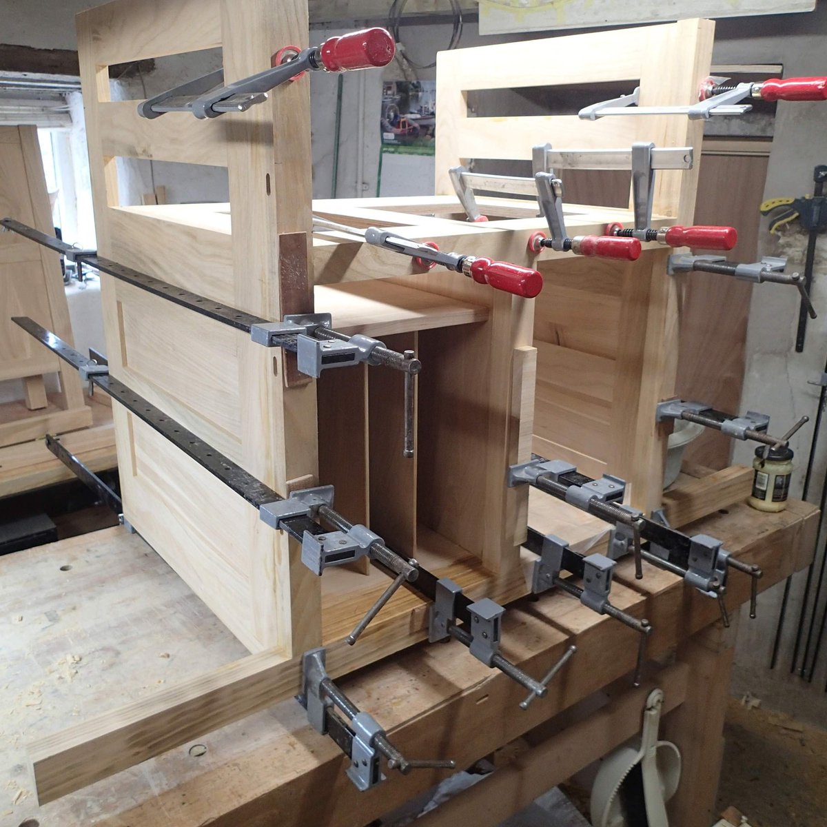 hilltopfurn's tweet photo. @laurenlaverne Hi Lauren, normally I make fine furniture but because I can't meet with customers, get wood from suppliers or do deliveries I am building a new kitchen for our house! Here is a picture of one of the units being glued up. https://t.co/6D6GN3Fai5