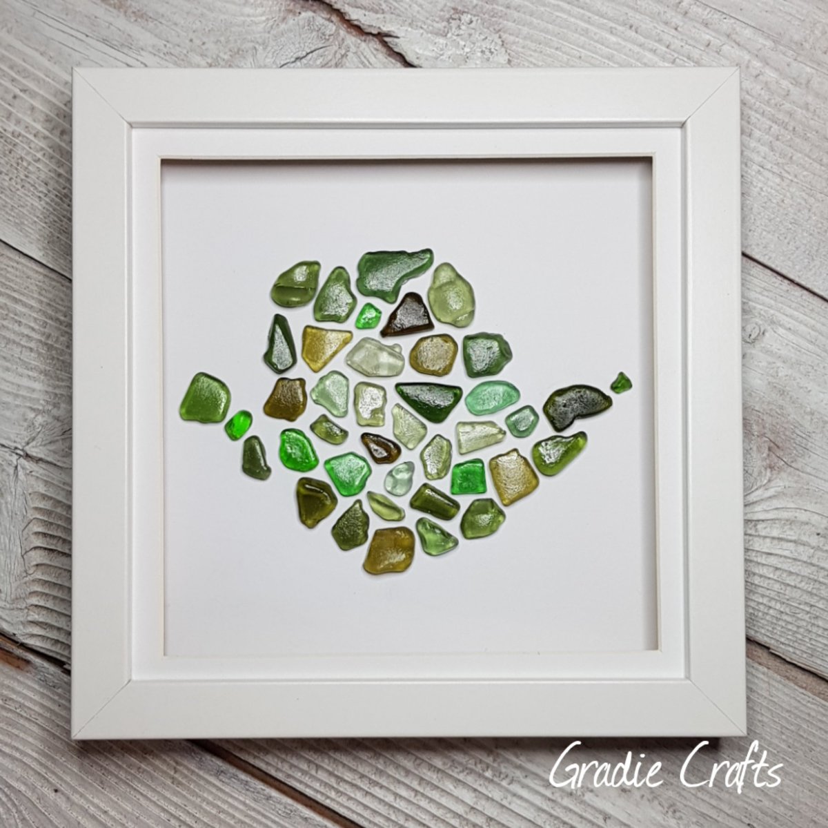 GradieCrafts's tweet photo. Home is where the heart is ❤ Seaglass mosaic made up of all the greens found on Anglesey  https://t.co/yKc5qfiYzM
#ynysmon #cartref #anglesey #angleseyseaglass #folksy #framedart #giftideas #lovewales #beachcombing https://t.co/CjIU3EpDKo