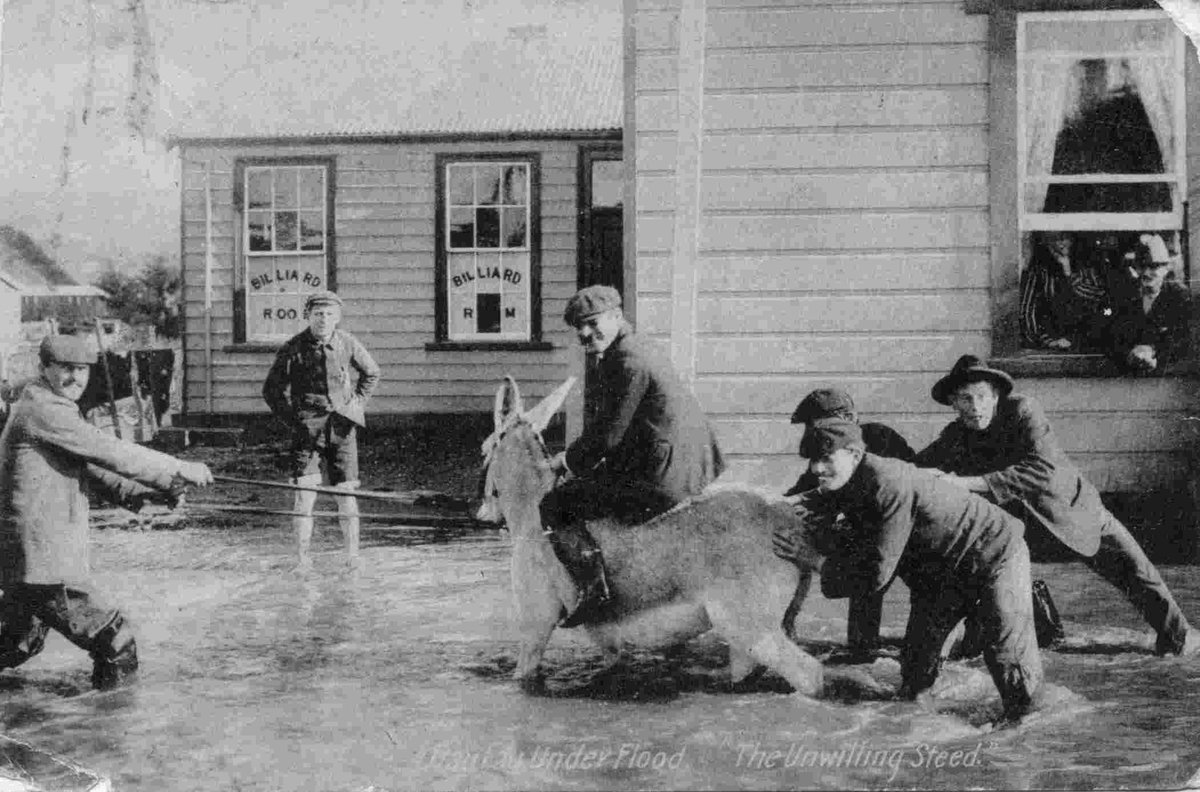 And yet another photodocumentary of Main Street scenes & businesses in Otautau, pre & post Covid: 1. The 2nd Otautau Hotel opened 1875, photographed during 1906 flood, CC 0; 2. The 3rd Otautau Hotel 1921, CC 0; 3. The 4th Otautau Hotel 1991, CC BY; 4. Otautau Hotel 13/5/20, CC BY