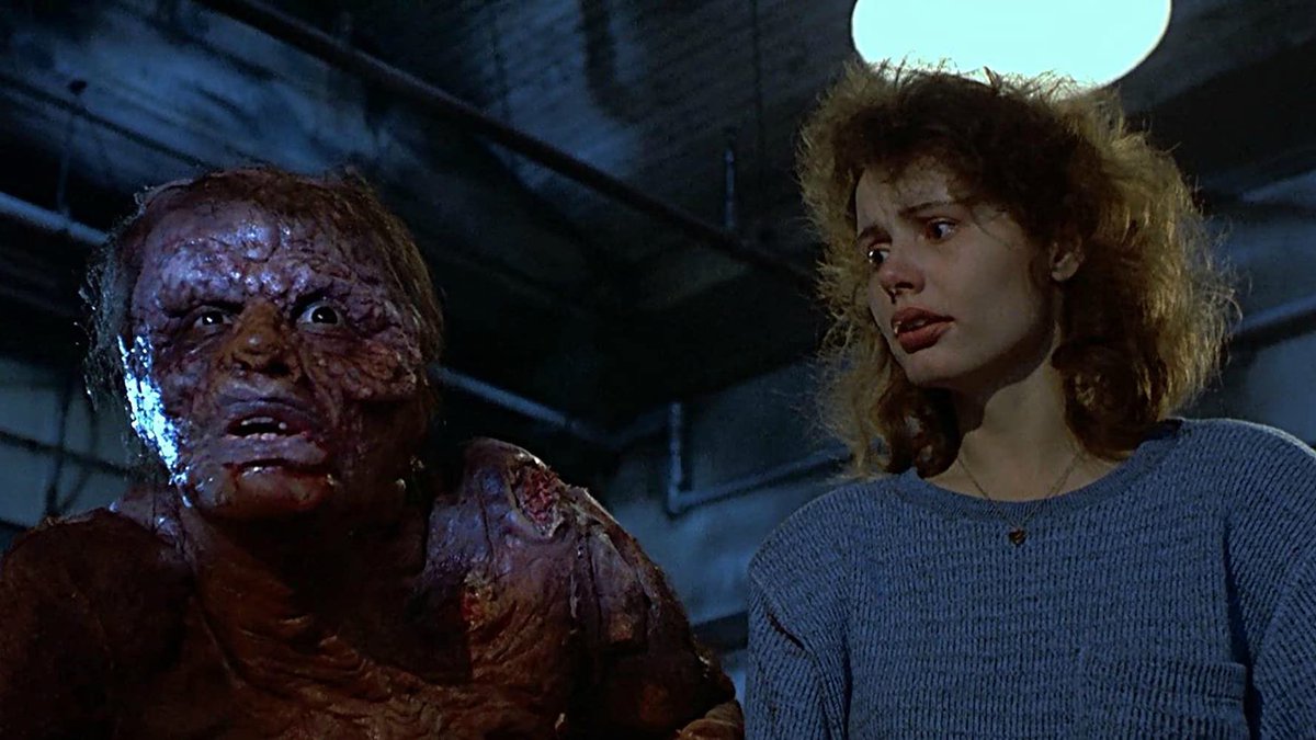 THE FLY ‘86 is a masterpiece of body horror. Operatic, tragic, romantic, yet perversely fun, the change to Langelaan’s story—making the scientist’s transformation a gradual one—opens up all sorts of themes of disease and aging, as well as David Cronenberg’s techno-interests.
