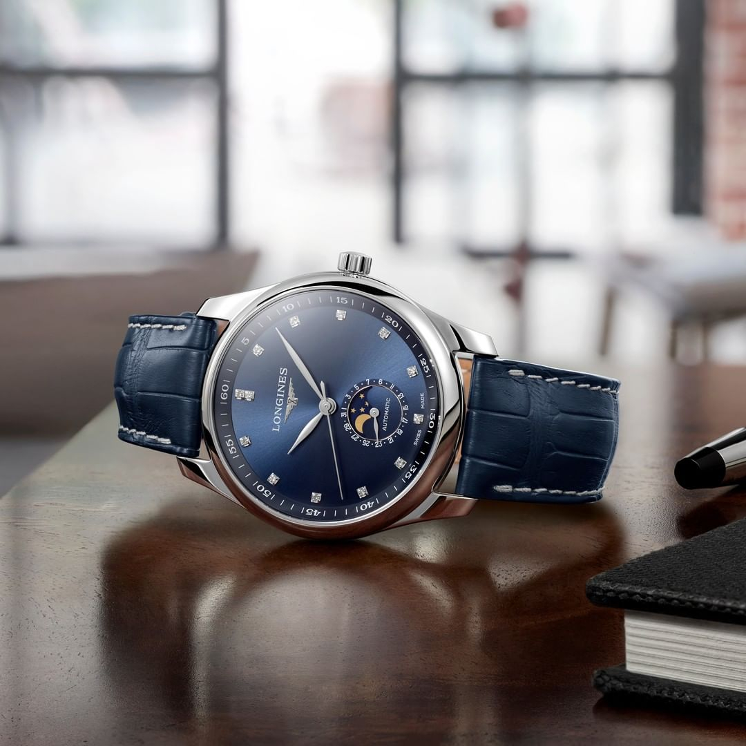 #WatchWednesday 
This Longines Master Collection model features a moon phase indicator at 6 o'clock circled by an Arabic numeral date ring. #LonginesMasterCollection #EleganceisanAttitude