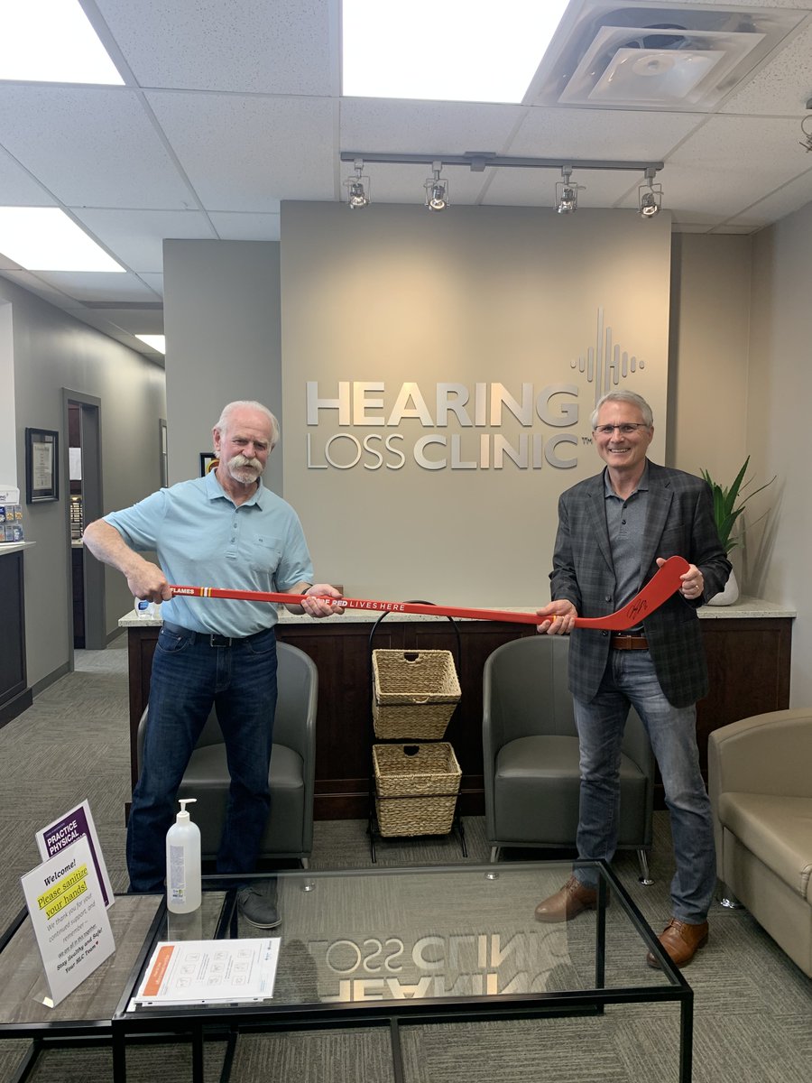 TheHearingLoss's tweet image. Hockey legend Lanny McDonald and NHL Medical Director Dr. Winne Meeuwisse are showing off their social distancing skills by staying one hockey stick length apart! 

Both were fit with @starkeyhearing #livioEdgeAI hearing aids at our North Hill office today!  #WednesdayVibes