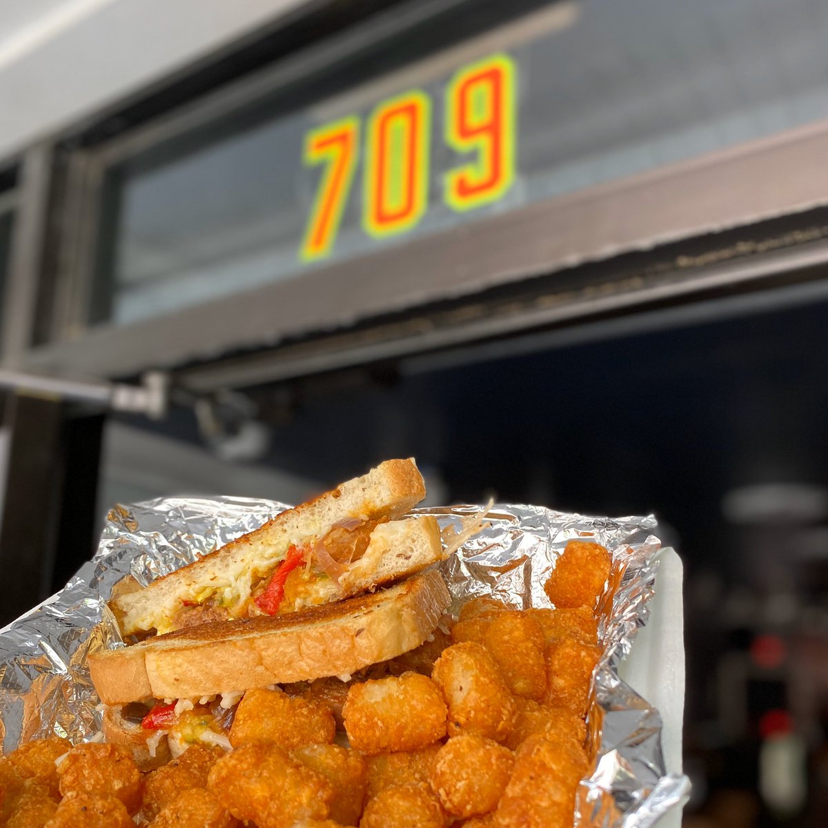 spacebarVA's tweet photo. this week’s special: 709 West Brat Street
bratwurst (pork or beyond meat) with sauerkraut, grilled peppers &amp; onions, sweet &amp; spicy pickle relish, yellow mustard, swiss &amp; provolone (or vegan cheese) on sourdough. this pic is of the #veganversion. https://t.co/Z42uc8qRnh https://t.co/Bk95W2SZcY