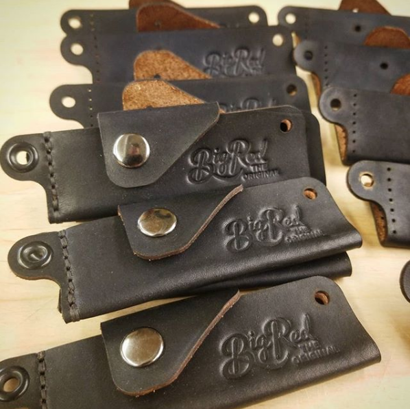 Hand dyed leather is cut, wet formed into shape, then hand stitched. Once the hardware is attached this Big Red No.22L is fit with your choice of fine or wide walnut comb. Perfect handcrafted keychain companion for grooming on the go.