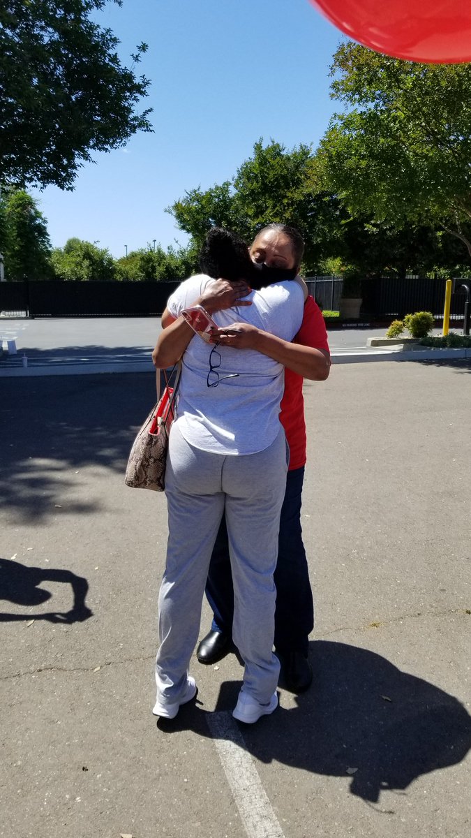 Liyah and her aunt embrace