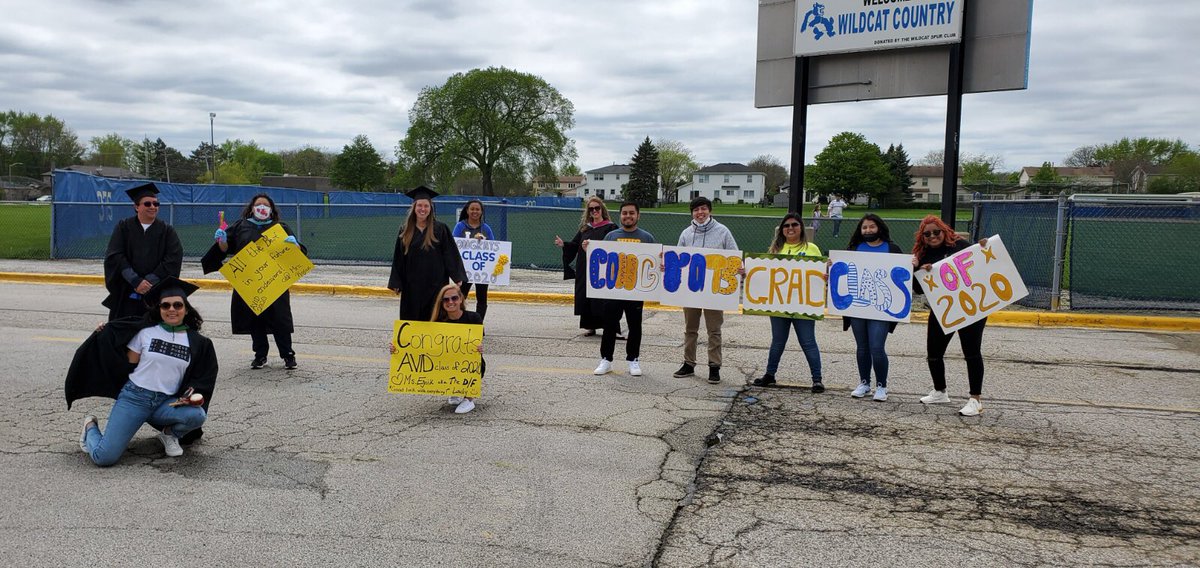 WheelingHS_AVID's tweet photo. Congratulations Seniors from the AVID site team. Social distancing at the parade today.  @RojasWHSAVID @castrorebe @Adriana_S0t0 @ErinEjnik https://t.co/ZTPNu8b6n7