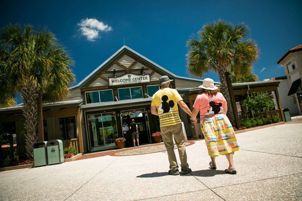 DisneyParks's tweet photo. Welcome back! Guests were greeted by cast members at Disney Springs this morning as part of the phased reopening. Keep an eye on the Disney Parks Blog for more details.✨ https://t.co/aOzQCQxR8q