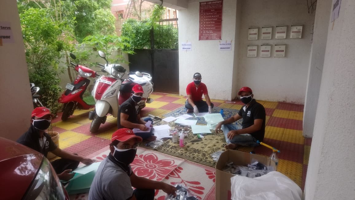 Paragsat's tweet photo. Some of my teammates @BridgestoneInd volunteered to package and dispatch masks to our partners in the regional warehouses across India. Proud of my team, appreciate this special gesture #OurWayToServe #WeAreBridgestone https://t.co/5QrfqNeyok