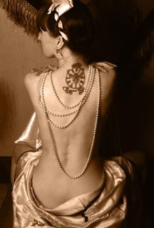 RubyLuck69's tweet photo. This first photo reminds me of the pre-1920's old tin type photos of the old time carni women with the tattoos that worked in the circus sideshows. To see more content like this come and check out: https://t.co/svKcAYMgG8 #burlesque  #tattooed https://t.co/60RDM1jEKl