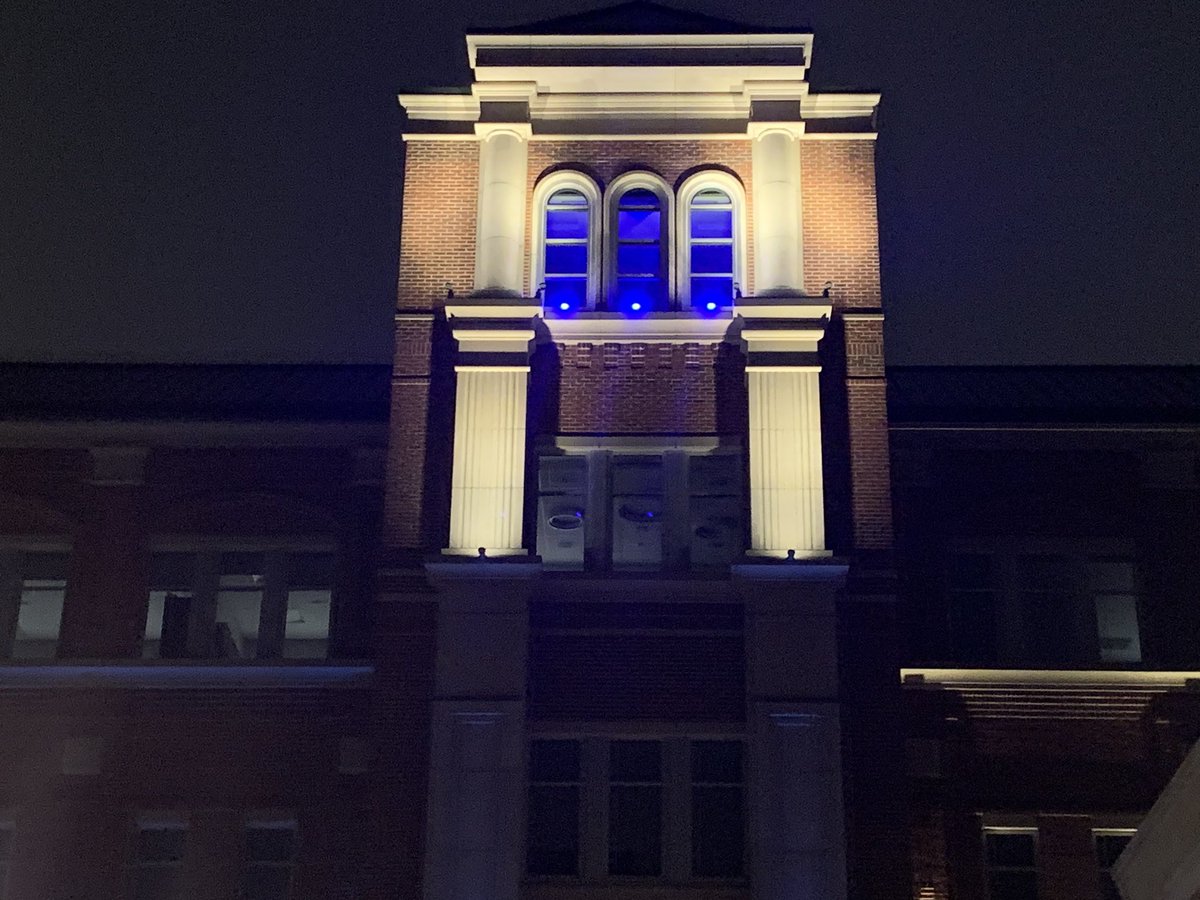 GrapevinePolice's tweet photo. Tonight our tower shines blue in honor of Captain Ron Hudson. Tomorrow he is retiring after 36 years of service as a Grapevine Officer. https://t.co/T4GIH5uBxo