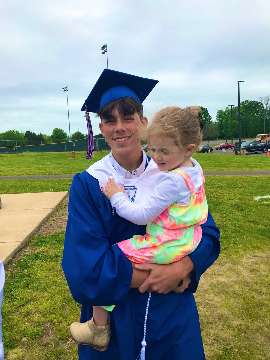 Cmk1299's tweet photo. I watched my (not so) little brother walk across an empty field this morning. He threw his cap alone, he walked with our parents, and his siblings were the only ones screaming from the stands. It was hard, you walked through life with your head high. I’m so very proud of you. ❤️ https://t.co/W9O17coazV