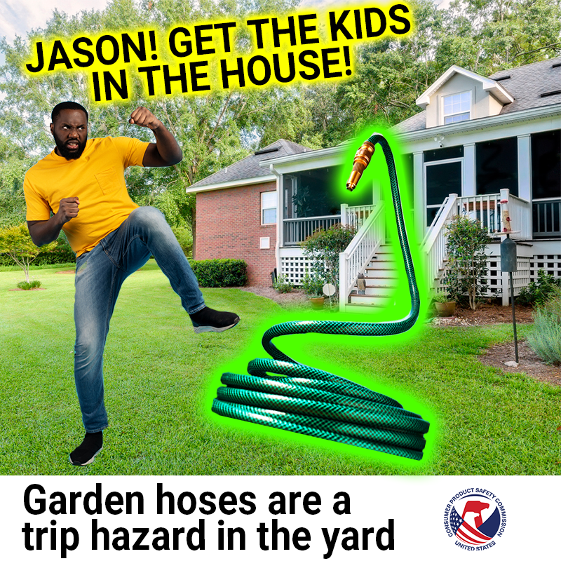A lovely suburban home with a garden hose that has come to life attacking a homeowner. The text reads: Jason! Get the kids in the house! Garden hoses are a trip hazard in the yard.