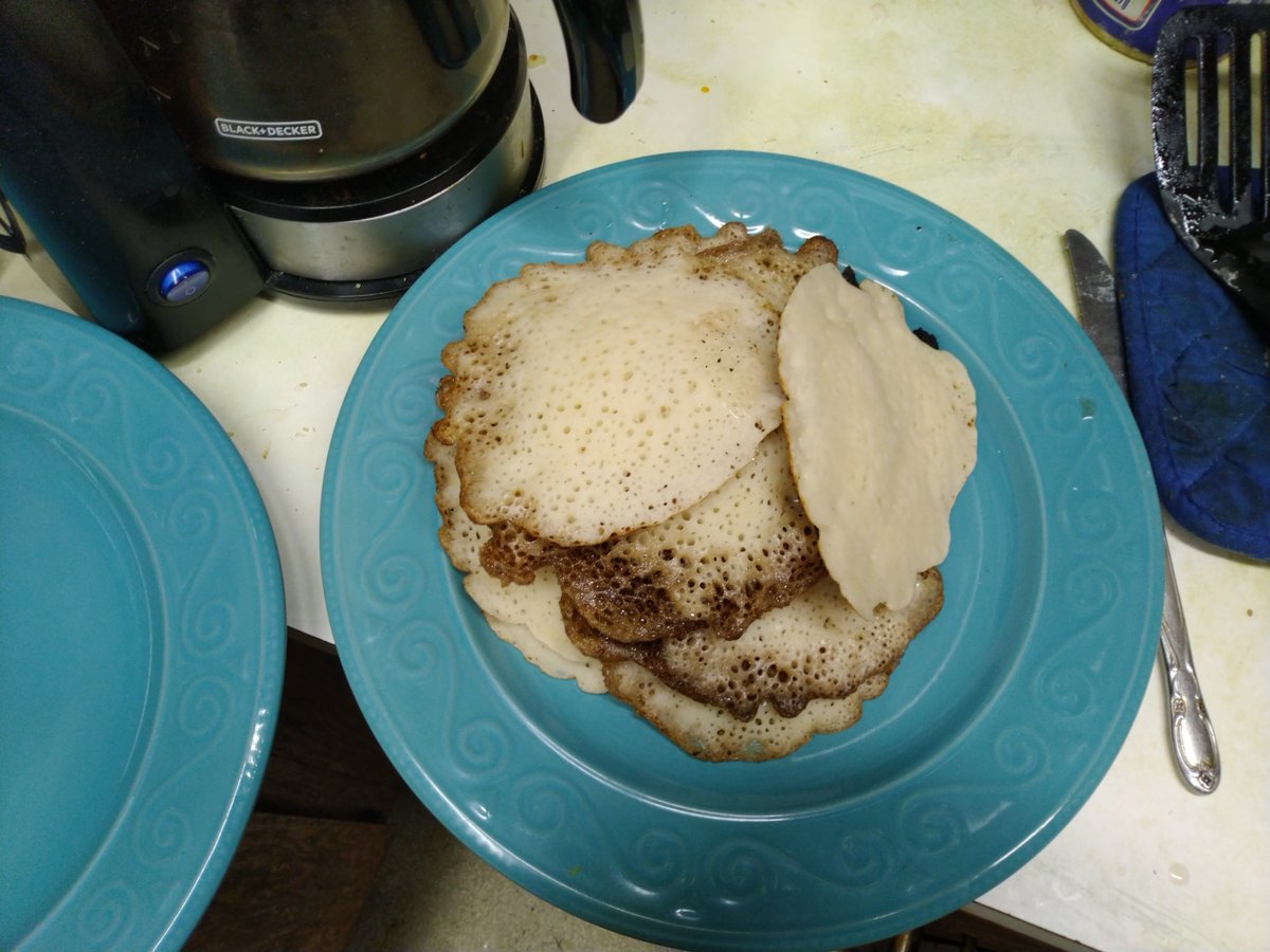 Crepes Milles Trous ("Thousand-hole crepes").  Made with both yeast and baking powder leaveners.