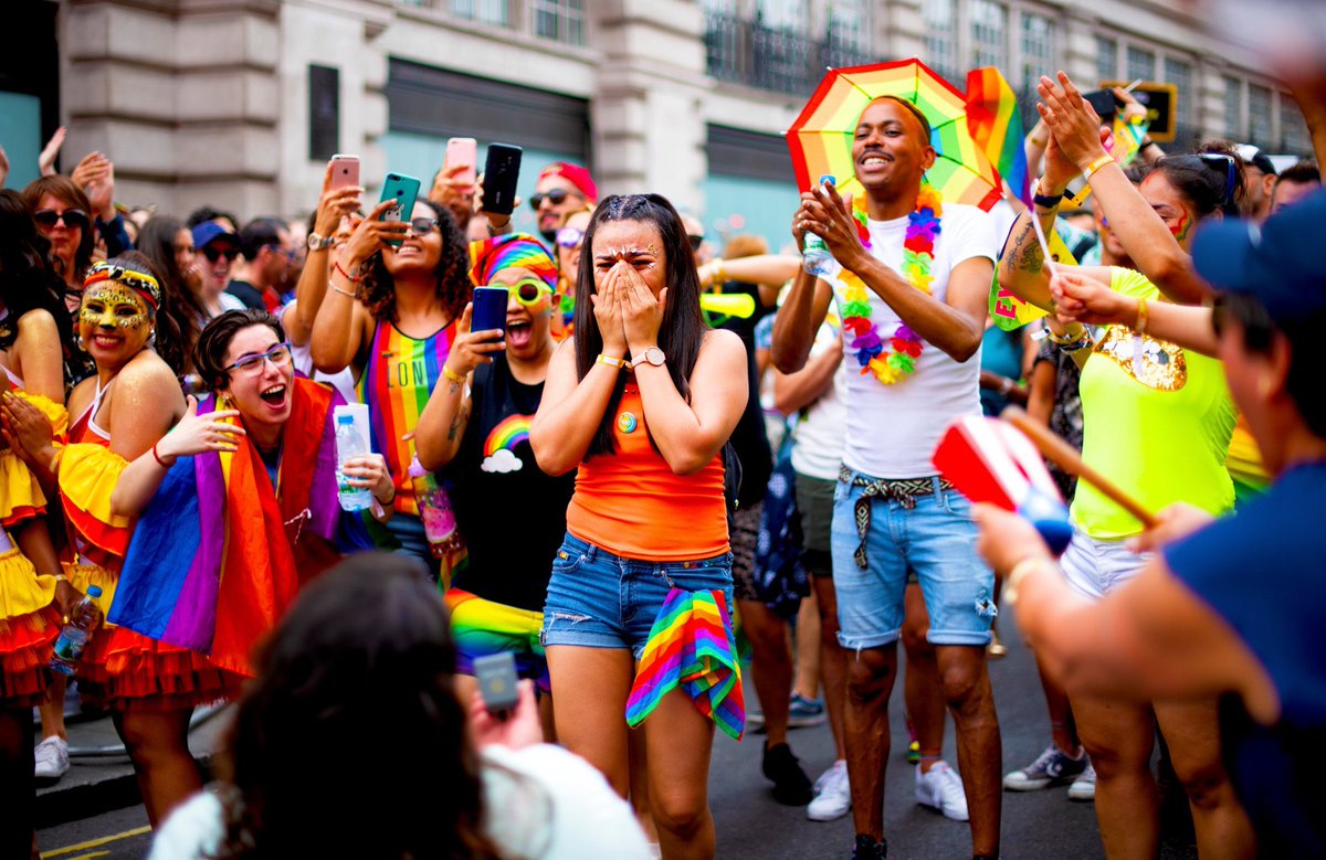 PrideInLondon's tweet photo. Congrats to @DoodleBugImages - winner of @LoveinLondon20 with a beautiful photo from last year’s parade day, titled 'Proposal at London Pride 2019! 👏💖 https://t.co/dLRPhviEew