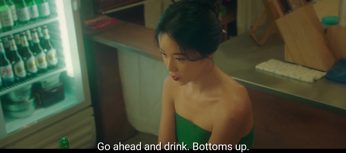 I really liked how they incorporated the light of the beverage display chiller in her shots. It gives her that angelic glow while the soju bottles bathed in light (and her outfits) are apt as green is the color of healing, soothing, and renewal-- her mission.  #MysticPopUpBar