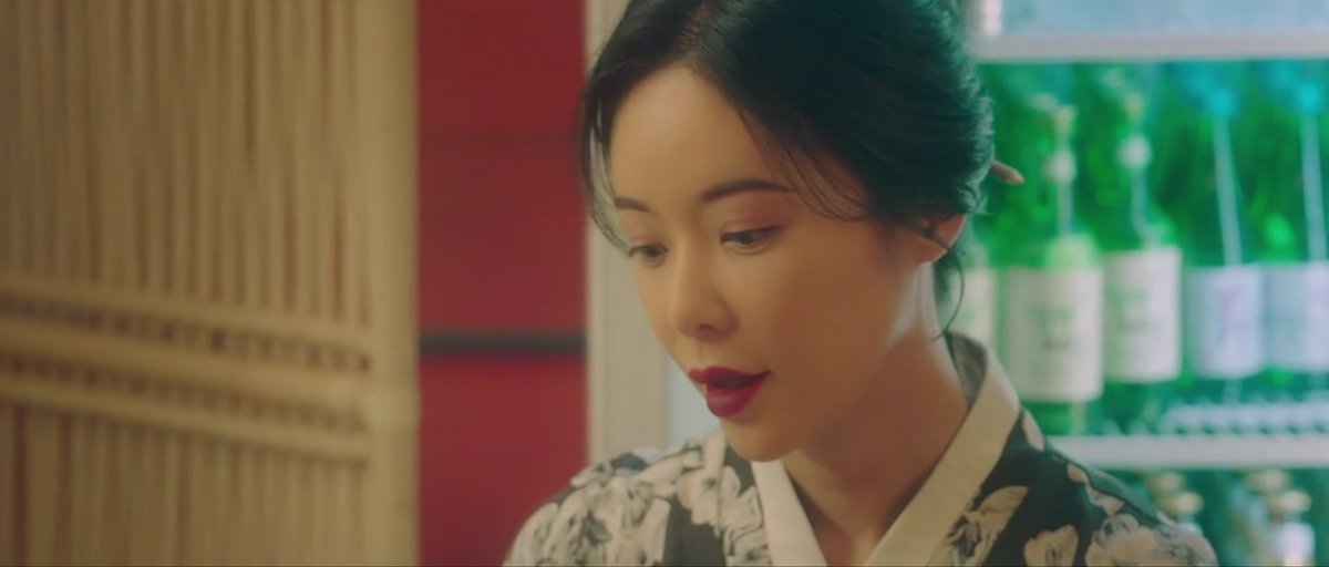 I really liked how they incorporated the light of the beverage display chiller in her shots. It gives her that angelic glow while the soju bottles bathed in light (and her outfits) are apt as green is the color of healing, soothing, and renewal-- her mission.  #MysticPopUpBar