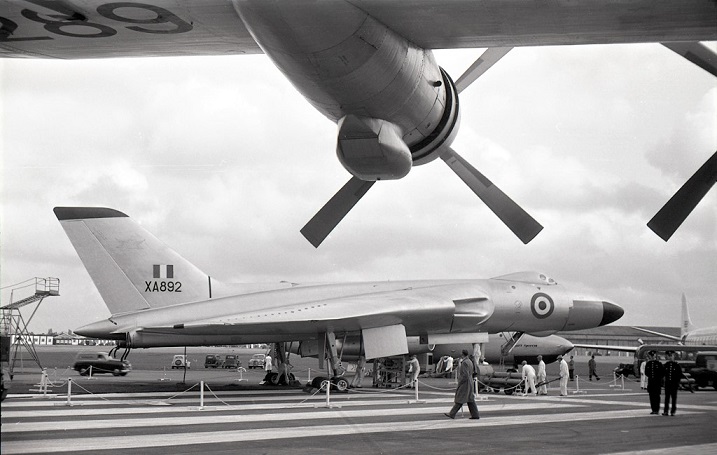 Today's Header Photograph is Avro Vulcan XA892 taken from underneath the wing of Blackburn Beverley XB289  at Farnborough in 1956. #johnstroudarchive #avrovulcan #blackburnbeverley #farnborough