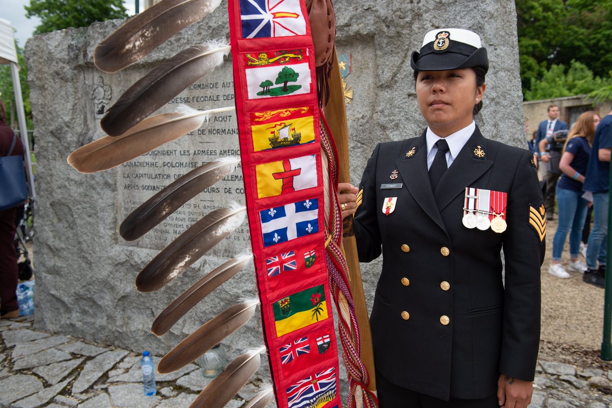 #ThrowbackThursday: During the commemoration of #DDay75 and the Battle of Normandy in Chambois, France, on June 4, 2019, PO2 Katerina Stewart carries the #EagleStaff for the unveiling of a monument dedicated to the Canadians who fought and died in #WWII. #IndigenousAwarenessWeek