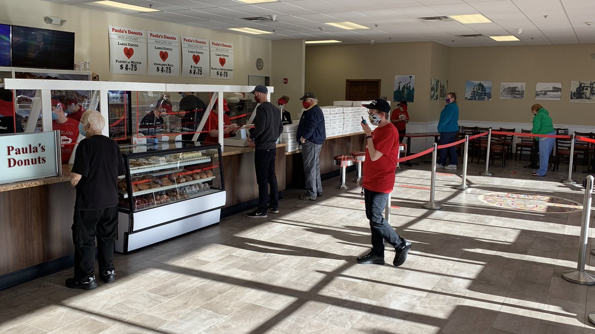 PhotogWKBW's tweet photo. The line is out the door at @PaulasDonuts, but thats partially due to new rules in place. Only ten customers are allowed inside at any given time. I’m told that every thirty minutes there is a “sanitizing period”. 

There is a pre-paid pickup area outside as well. @WKBW https://t.co/oIZqhiBRsH