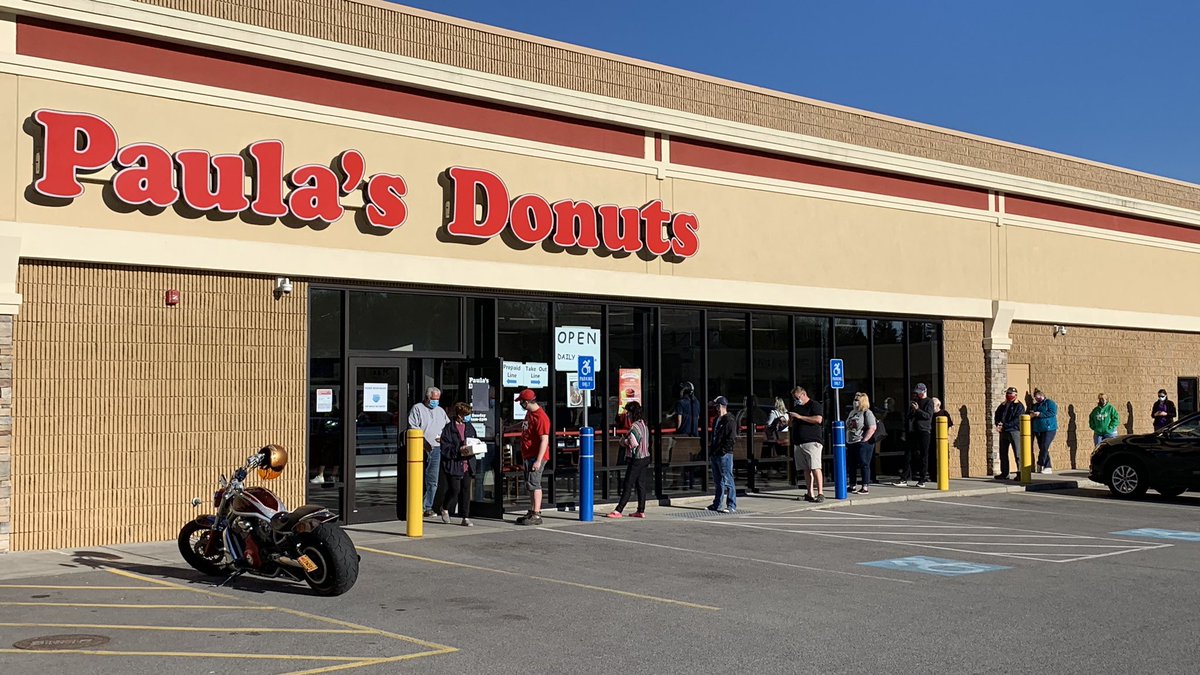 PhotogWKBW's tweet photo. The line is out the door at @PaulasDonuts, but thats partially due to new rules in place. Only ten customers are allowed inside at any given time. I’m told that every thirty minutes there is a “sanitizing period”. 

There is a pre-paid pickup area outside as well. @WKBW https://t.co/oIZqhiBRsH