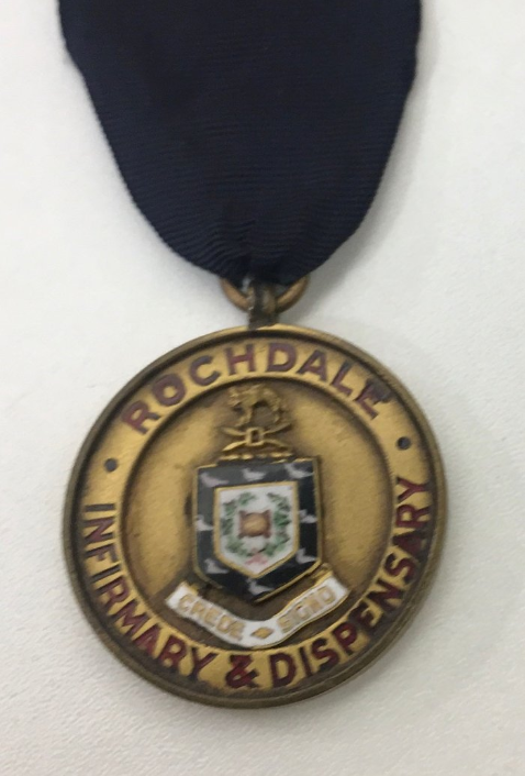 RCNLibraries's tweet photo. Bringing even more heat to this sunny day is this badge from Rochdale Infirmary & Dispensary 🔥 The roots date back to 1832 when banker Clement Royds + associates opened a dispensary to meet the needs of the sick and poor #BadgeoftheWeek #Rochdale #BadgeFlair #histnursing https://t.co/UHAvs8HgXN