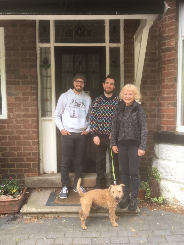RefugeesAtHome's tweet photo. Number 4 in #LockdownDoorstep #Hosting comes from #Manchester where Kirsten and her son, Martin have hosted Ayman for 62 nights. Ayman loves Reggie, the dog & the cat (who nixed a photo-op) #DoorstepDogs #DogsOfHosting You donโt need a dog to host! https://t.co/UVLRDcM5jj