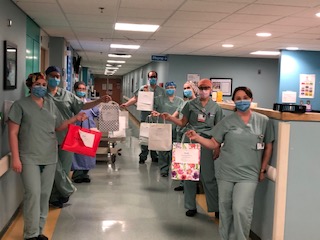 HealthCareFdnNL's tweet photo. HUGE thank you to Bellie Beth for continuing to surprise frontline hospital staff with gifts from their store! Pictured here is staff of the COVID-19 unit at the Health Sciences Centre. https://t.co/15kDRaB1KQ