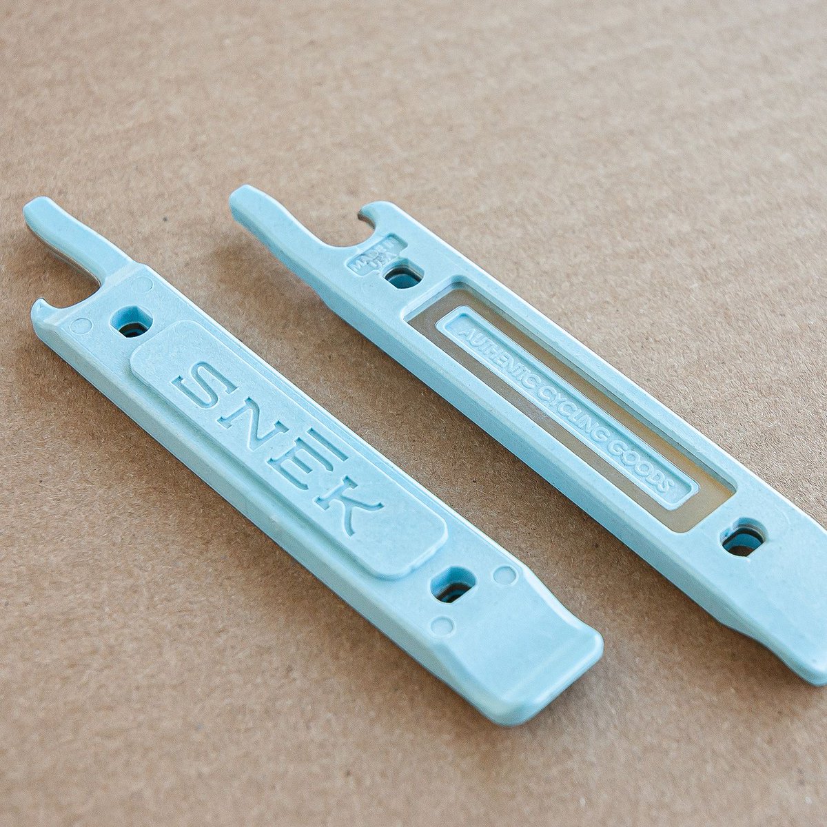SnekCycling's tweet photo. New colors. Built to last, and guaranteed for life, our Lifeboat Tire Levers are now available in two new colors. Military green and baby blue. Also, get a limited Lifeboat Tee for $10 with the purchase of a lever. Use code: LIFEBOAT at checkout.https://t.co/S2ekt6psFI https://t.co/OaPxT2bmDu