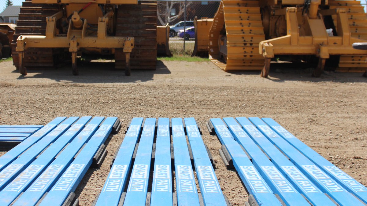SmartpathSystem's tweet image. SmartPath landing area in progress!  Align the panels and simply add joiner boards in between panels, over the patented side supports of the rubber bases.  
A landing area is a useful spot to drop material such as bricks, shingles, or other supplies for the worksite.