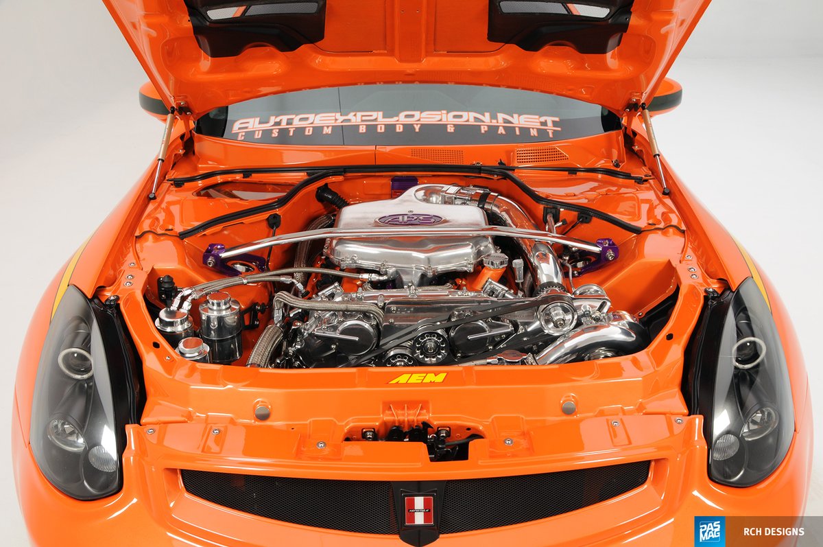 PASMAG's tweet photo. Under the hood of the G35, Riggs wanted to make a statement and spent much of his $50,000 build in that area. https://t.co/DfR7LGBv64 #pasmag #throwback #tbt #flashback #infiniti #g35 #aemintakes #aemelectronics #vortech #greddy #tein #recaro #getnrg #audison #hertz #dynamat https://t.co/VY1bOvm16R