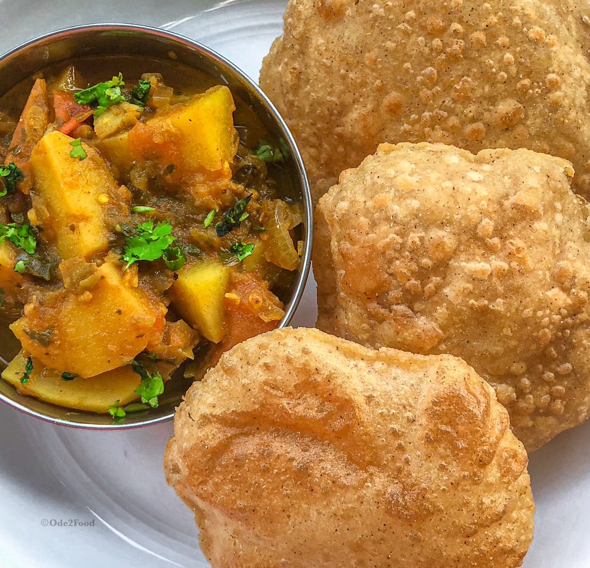 Just a little fried bread and potato curry action. Who ever says no to carb on carb? 

Poori & aaloo curry = classic ❤️

Recipes now on supriyaraman.com or instagram.com/Ode2Food 

#veganindian #indianvegan #comfortfood #QuarantineCooking