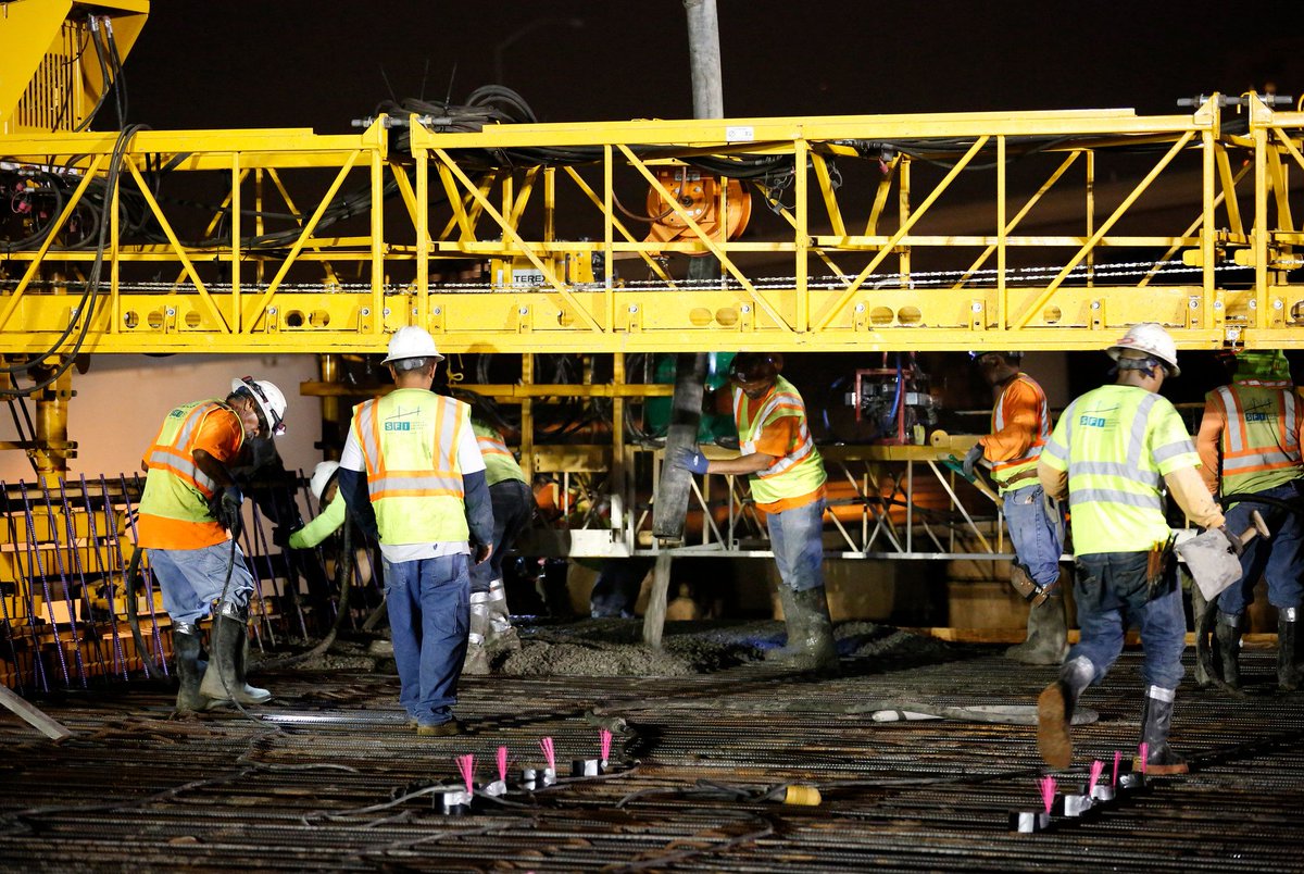 Concrete pours for our approach spans involved crews deployed in different areas to place, smooth, and texturize the concrete at the same time, and they require that workers constantly keep things moving. #TBT