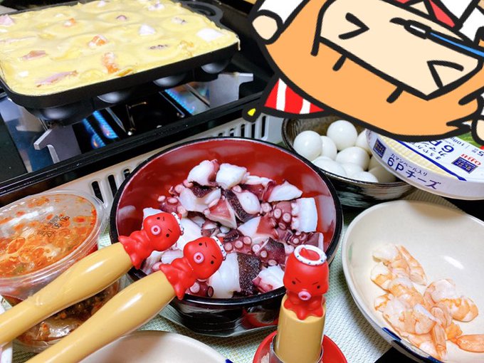 直火でタコ焼いてる 