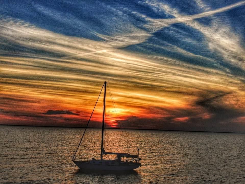 spann's tweet photo. Sunset this evening over Mobile Bay... photo from John Oldshue https://t.co/H7NtAW7eF1