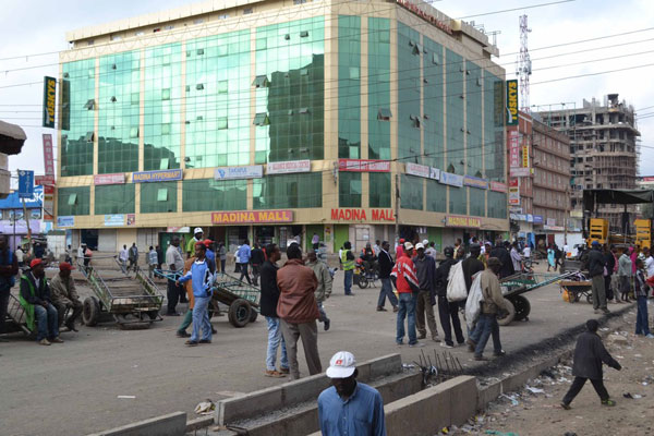 NationBreaking's tweet image. POLICE USE tear gas to disperse crowds at Mlango Kubwa who tried to force their way into Eastleigh to do menial jobs, sell groceries.