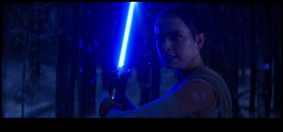 By the climax of the movie Rey calls the saber and it comes to her rather than Kylo. Many see this as the saber now belonging to her case closed; and while this is true in a way, it's not how Rey sees the situation. And we know this because of what happens next...