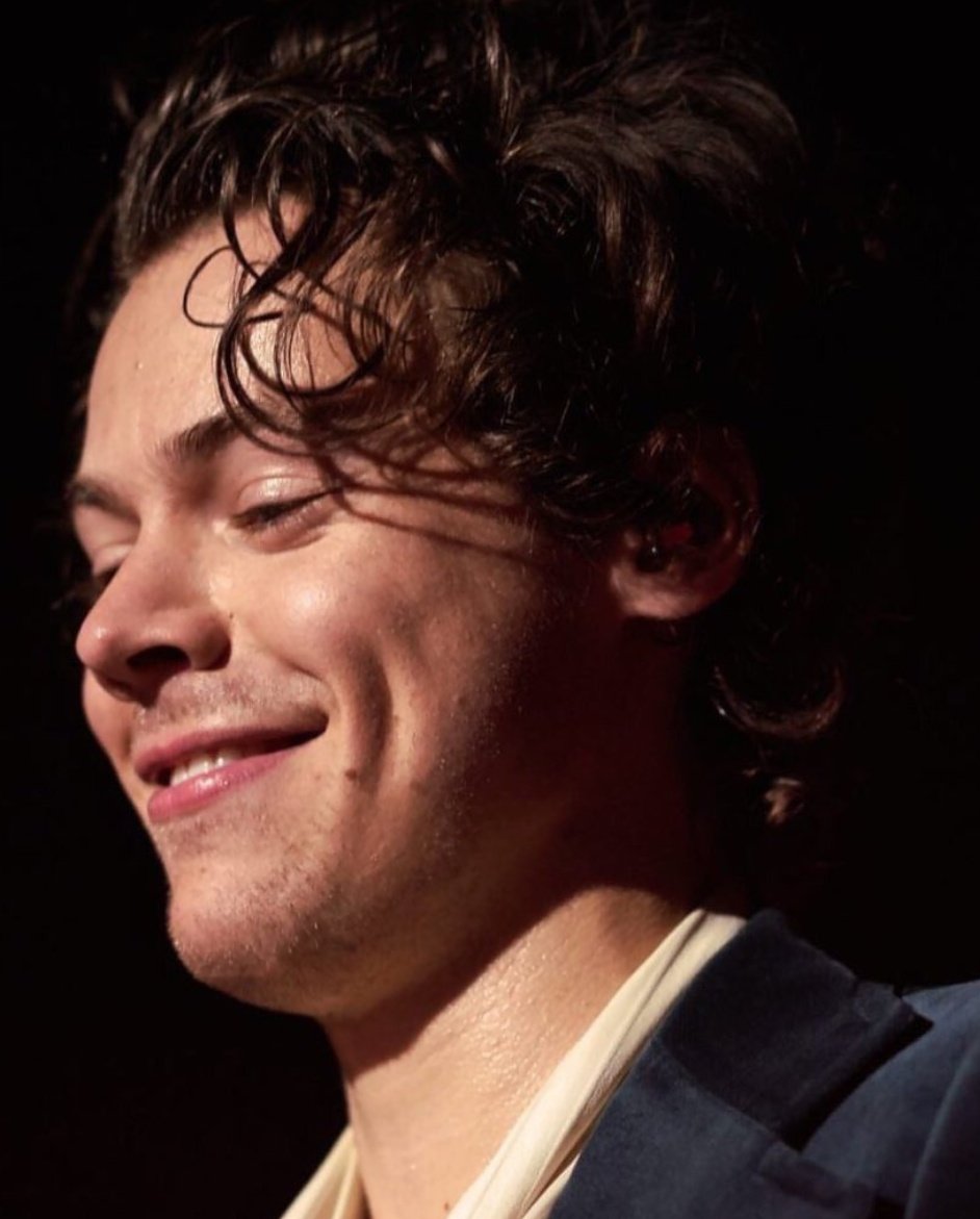 Harry Styles smiling but his smile keeps getting bigger as you scroll down.